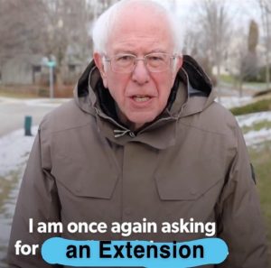 A meme of politician Bernie Sanders originally asking for financial support. The caption is instead, “I am once again asking for an Extension.”